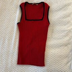 Red ribbed knit tank with black detailing.